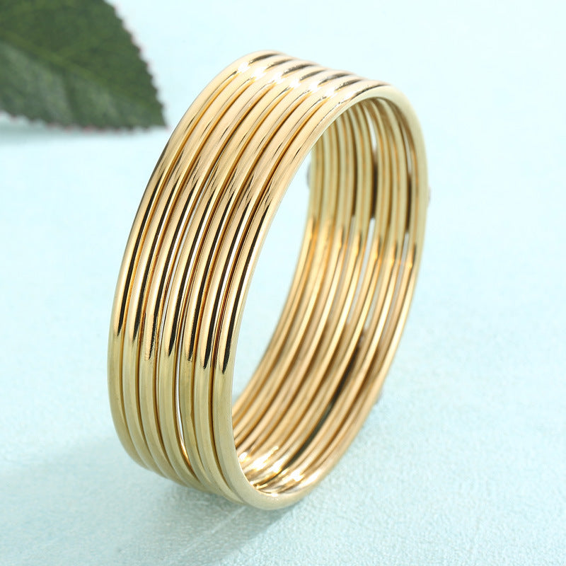 smooth plain circular ring bracelet with multiple layers for wearing wristbands and accessories