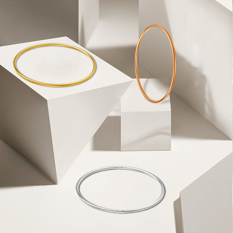smooth plain circular ring bracelet with multiple layers for wearing wristbands and accessories