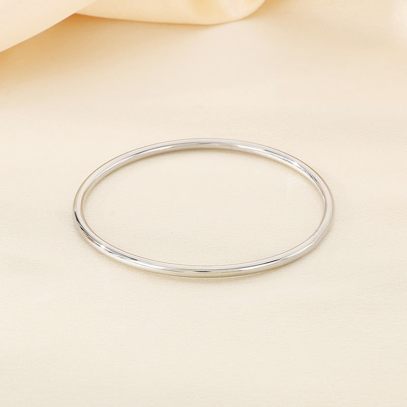 smooth plain circular ring bracelet with multiple layers for wearing wristbands and accessories